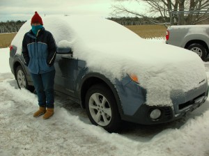 At this time of year, a car's color doesn't much matter. The coat? Blue. A hand-me-down from another sister. The jeans? A special on ebay. The high cost of blue.